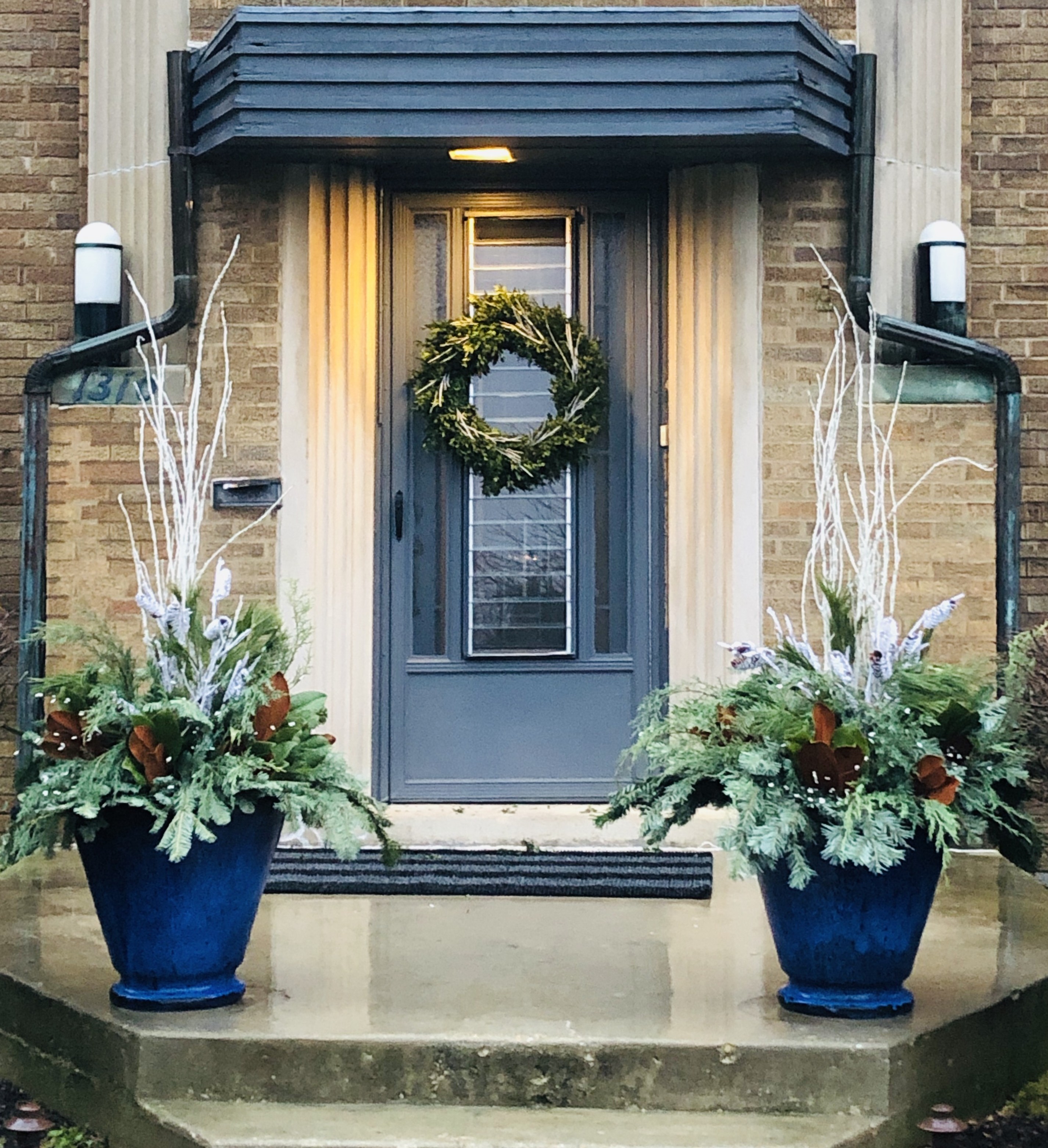 Winter porch planter with evergreens